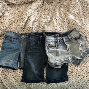 Practically brand new jean shorts . lucky pair worn once , other never worn.